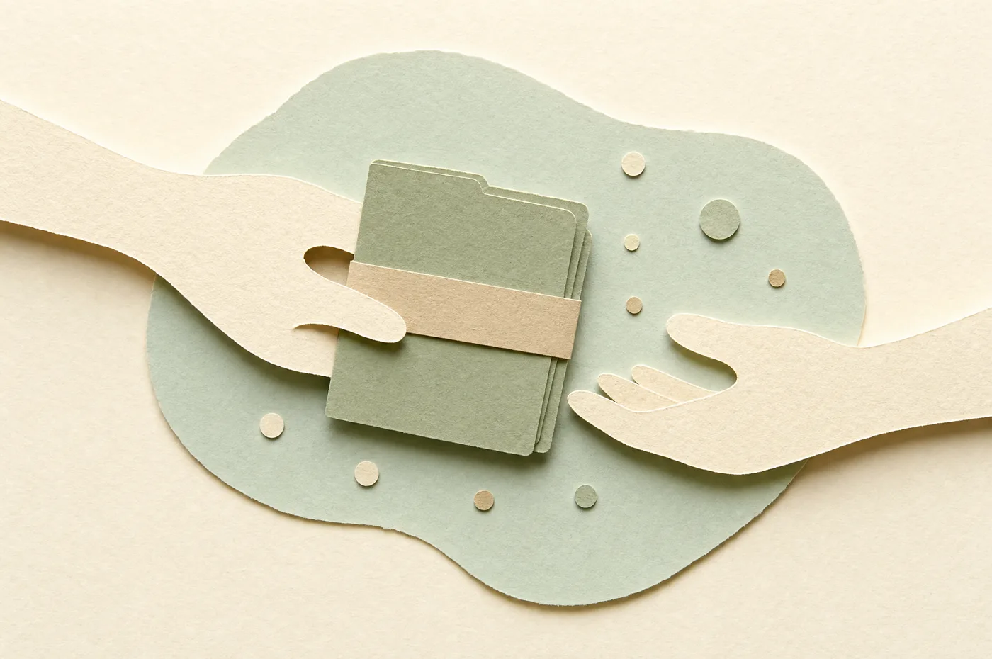 One cut-paper hand passes a neatly banded folder to another open hand